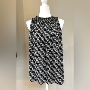Loft classy sleeveless top with flamingo design.